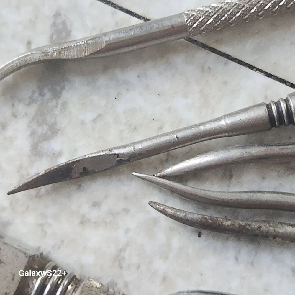 Silver metal Vintage Embossed Nutcracker & Six Picks set